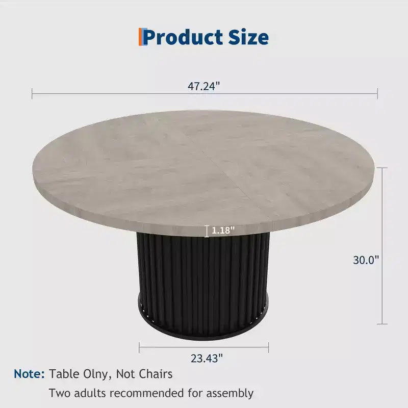 Table à manger ronde avec un piètement en métal ondulé