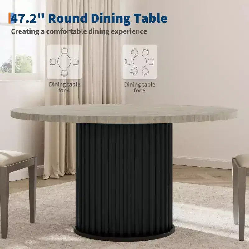 Table à manger ronde avec un piètement en métal ondulé