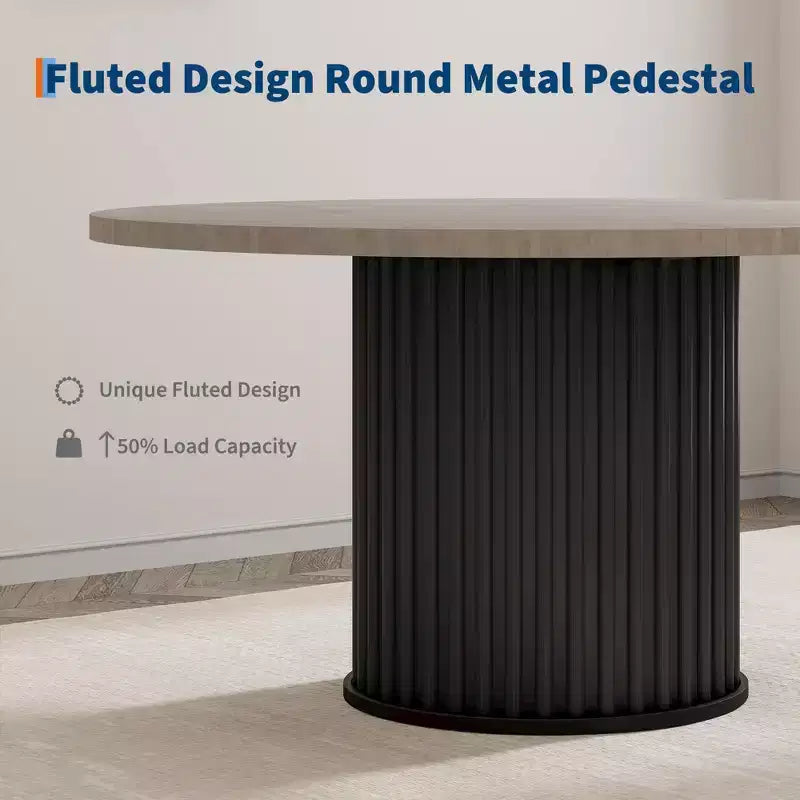 Table à manger ronde avec un piètement en métal ondulé
