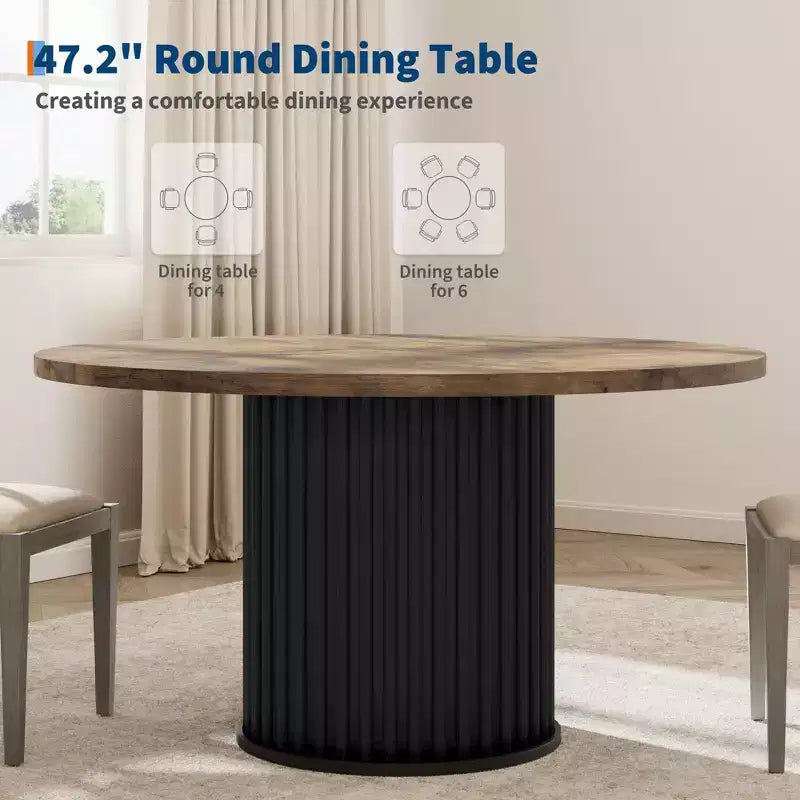 Table à manger ronde avec un piètement en métal ondulé