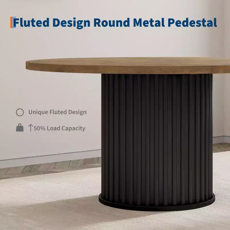 Table à manger ronde avec un piètement en métal ondulé