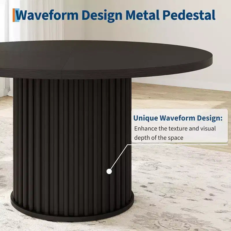 Table à manger ronde avec un piètement en métal ondulé